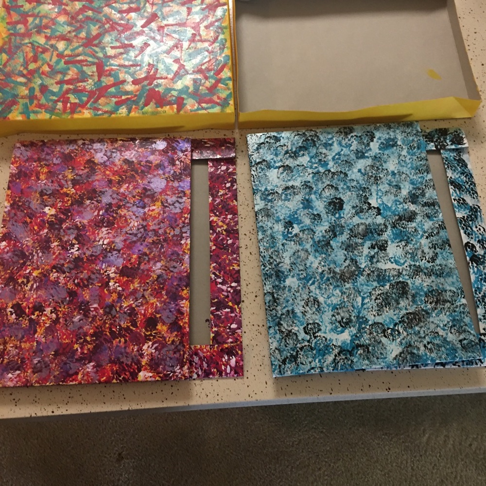 Hand painted tee shirt or accessories boxes.